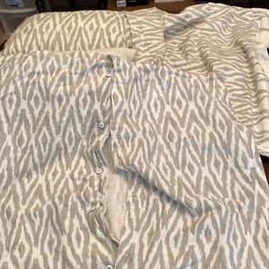 Two euro shams zebra like print and 2 throw pillows.